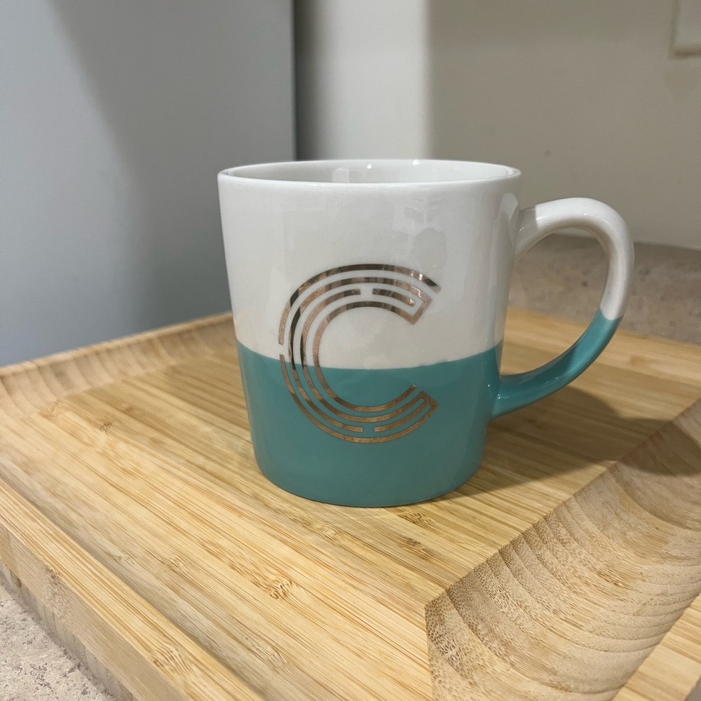 Coffee mug with “C” on it